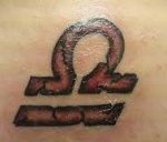Libra Zodiac Symbol Tattoo.